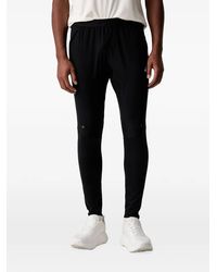 Asics - Pantalon De Jogging Road À Logo Imprimé - Lyst
