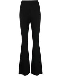 Stella McCartney - Ribbed-Knit Flared Trousers - Lyst