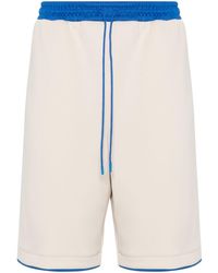 Gucci - Pantalones cortos de deporte con aplique del logo - Lyst