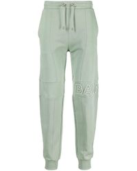 Balmain - Logo-Embossed Track Pants - Lyst