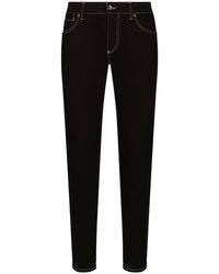 Dolce & Gabbana - Jeans slim con cuciture a contrasto - Lyst