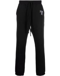 More Joy - Pantalones joggers con logo bordado - Lyst