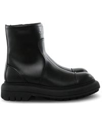 Givenchy - Logo-Embossed Leather Boots - Lyst