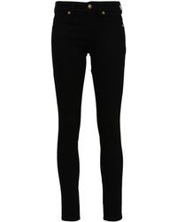 Versace - Skinny-Jeans mit Logo - Lyst