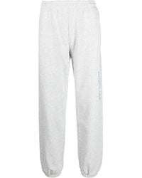 Sporty & Rich - Pantalones de chándal elásticos con logo estampado - Lyst