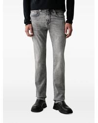 KARL LAGERFELD - Logo-Patch Jeans - Lyst