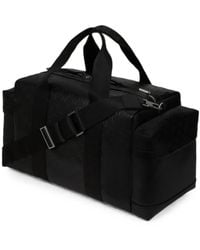 KARL LAGERFELD - Monogram Perforated Weekender Bag - Lyst