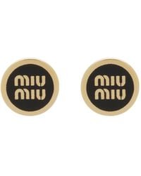 Miu Miu - Pendiente con logo en relieve - Lyst