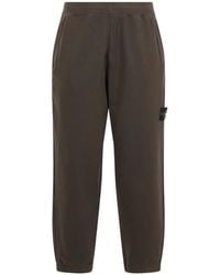 Stone Island - Logo-Badge Cotton-Fleece Track Pants - Lyst