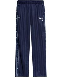 PUMA - X Guizio Striped Logo-Print Pants - Lyst