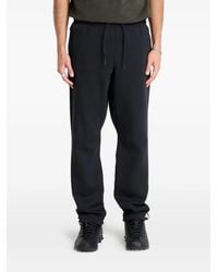 Nike - Pantalones de chándal con cordones y logo - Lyst