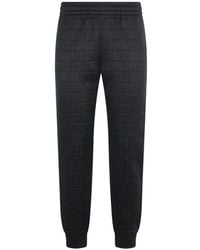 Moschino - Logo-Pattern Elasticated-Waistband Track Pants - Lyst