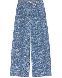 Ganni - Jeans Met Bloemenprint En Wijde Pijpen - Lyst