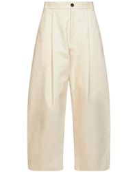 Studio Nicholson - Sorte Pleated Curved-Leg Trousers - Lyst