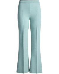 High Sport - Pin-Tuck Flared Trousers - Lyst