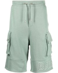 Balmain - Embossed-logo Cotton Bermuda Shorts - Lyst