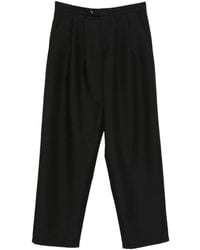 LC23 - Pleated Wool Trousers - Lyst