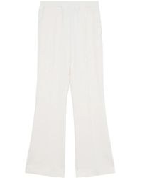 JW Anderson - Tech-Jersey Flared Trousers - Lyst