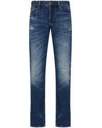 Emporio Armani - Jeans slim con effetto vissuto J06 - Lyst