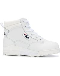 all white fila high tops