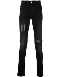 Amiri - Jean À Effet Usé Et Appliqué Du Logo - Lyst