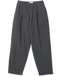Universal Works - Oxford Pleated Trousers - Lyst