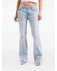 Juicy Couture - Crown-Embroidered Flared Jeans - Lyst