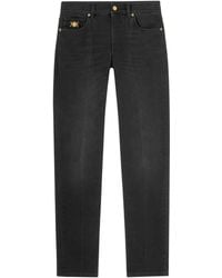 Versace - Halbhohe Slim-Fit-Jeans mit Medusa Head-Verzierung - Lyst