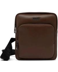 Guess - Boston Logo-Plaque Zip-Around Cross Body Bag - Lyst