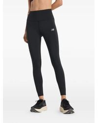 New Balance - Leggins con detalle del logo - Lyst