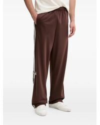 adidas - Adibreak Trainingsbroek Met Zijstreep En Knoop - Lyst