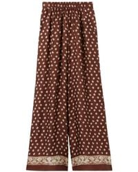 Claudie Pierlot - Pantalones palazzo con estampado floral - Lyst
