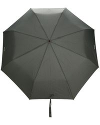 Moschino - Pinstriped Logo-print Compact Umbrella - Lyst