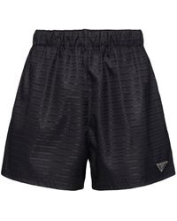 Prada - Shorts in Re-nylon con logo - Lyst