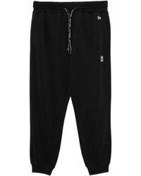 KTZ - Logo-Embossed Trousers - Lyst
