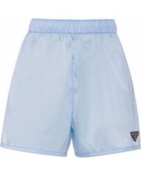 Prada - Pantalones cortos con placa del logo - Lyst