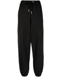 Moncler - Pantalon de jogging en coton à patch logo - Lyst