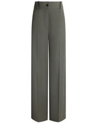 Patou - Flared Pressed-Crease Trousers - Lyst