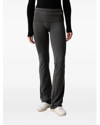 Guess - Lotus Rhinestone-Logo Flared Leggings - Lyst