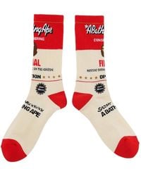 SAINT Mxxxxxx - Logo-Print Intarsia-Knit Socks - Lyst
