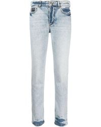 Versace - Tief sitzende Straight-Leg-Jeans - Lyst