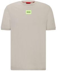 HUGO - T-shirt con applicazione logo - Lyst