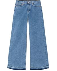 RE/DONE - Mid-Rise Frayed-Hem Jeans - Lyst