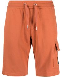 Calvin Klein - Pantalones de chándal con parche del logo - Lyst