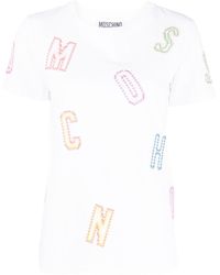 Moschino - T-Shirt mit Logo-Stickerei - Lyst