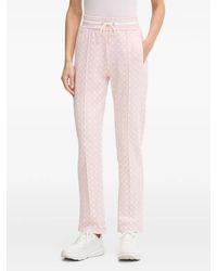 Guess - Logo-Patterned Track Pants - Lyst