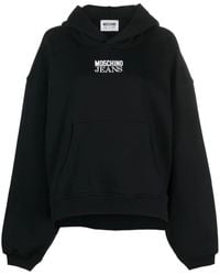Moschino - Logo-Print Cotton Hoodie - Lyst