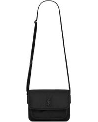 Saint Laurent - Kleine Niki Kuriertasche mit Logo-Schild - Lyst