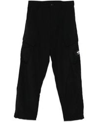 Izzue - Logo-Patch Trousers - Lyst