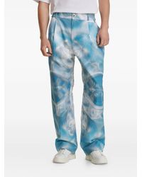 IRINA VOINEA - Printed Trousers - Lyst
